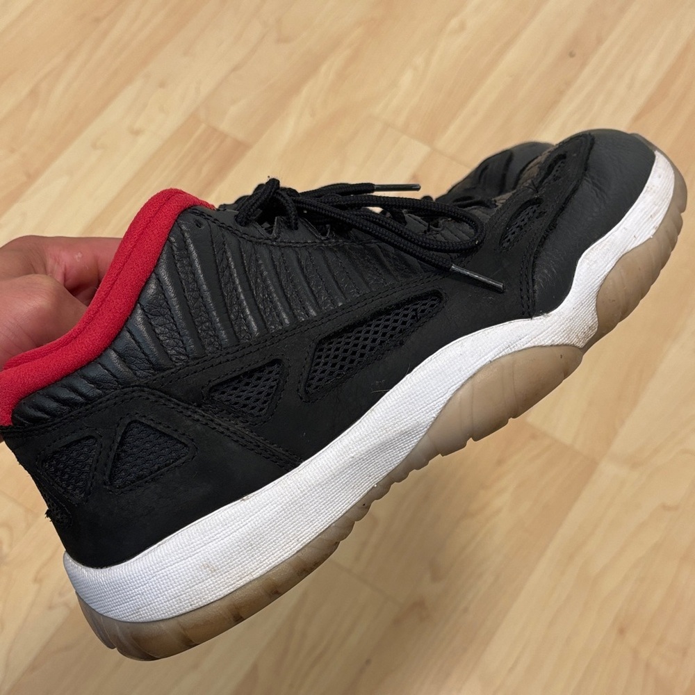 Jordan Black and Red Low-Top Sneaker with White Midsole